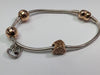 Pandora Charm bracelet With Rose Gold Charms