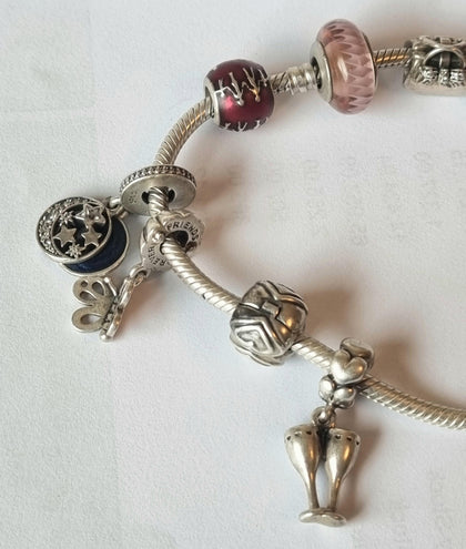 PANDORA BRACELET WITH 11 CHARMS 19cm.