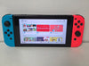 Nintendo Switch Neon Red/Blue & 1 Game