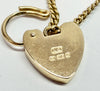 7" 9ct yellow gold curb link bracelet with heart clasp