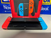 Switch Console, 64GB OLED + Neon Red/Blue Joy-Con