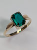 9ct gold ring with large green centre stone