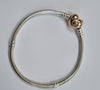 Pandora bracelet with gold heart clasp 17cm