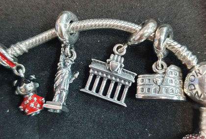 Pandora Bracelet with 8 Travel Based Charms..