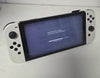 Nintendo Switch oled with 2 unboxed games