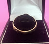 9CT - Yellow Gold Buckle Ring - 3.38g - Size Y. Hallmarked