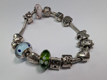 Pandora bracelet with 14 charms