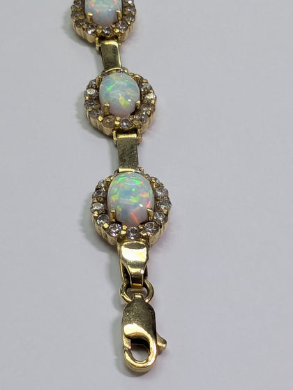 14CT GOLD BRACELET WITH MULTICOLORED STONES