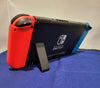 Nintendo Switch Console, 32GB + Neon Red/Blue Joy-Con
