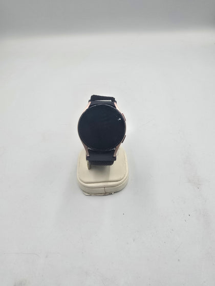 Samsung Galaxy Watch4 gold with charger