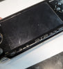 Sony PSP Handheld Game Console (PSP-1003) with charger