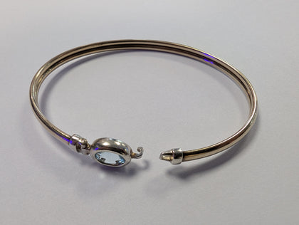 9ct Gold Bangle With Light Blue Centre Stone