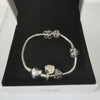 Pandora 8" Bracelet with 5 Charms, 25.71Grams, 925 ALE Hallmarked