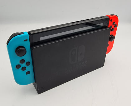 Nintendo Switch 32GB handheld console with red/Blue joycon, charger and cradle BOXED