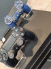 Playstation 4 Pro Console 1TB Black + 2 controllers