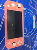 Switch Lite Coral Unboxed