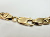 9ct yellow gold fancy link bracelet with an interlocking oval and loop design 8"