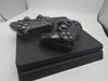 PlayStation 4 Slim 1TB Console with 2 controllers