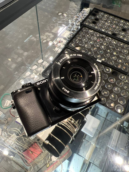 Sony Alpha A6000 Mirrorless Digital Camera 24.3MP with 16-50mm Lens, 64GB Sandisk Micro SD Card