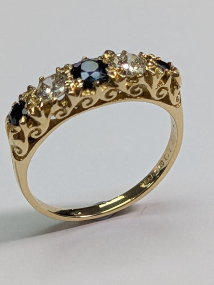 18CT GOLD DIAMOND & BLACK STONE RING SIZE J