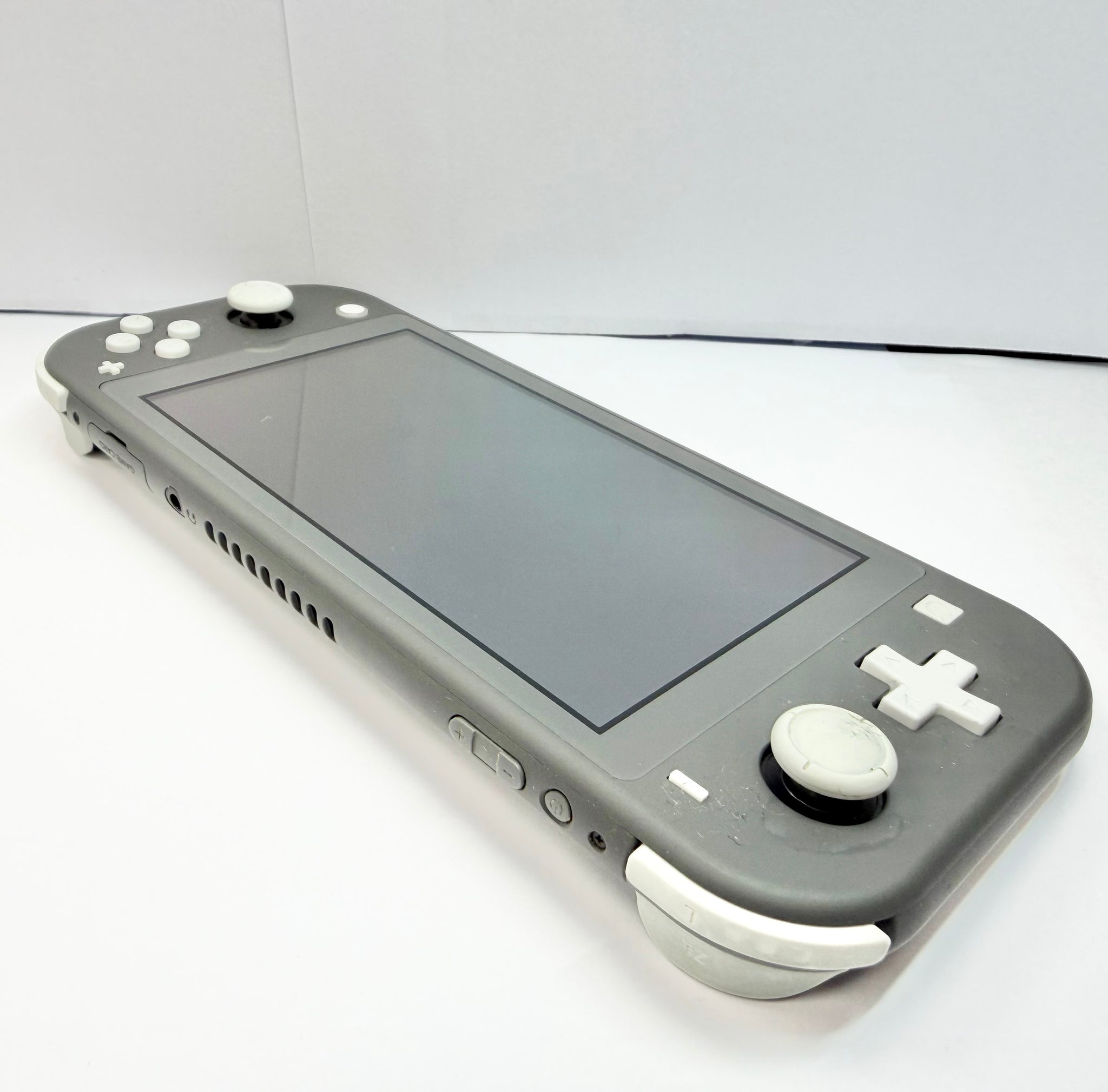Nintendo Switch Lite Console, 32GB Grey, Unboxed | Cash Generator Nintendo Switch Lite Console, 32GB Grey, Unboxed | Cash Generator