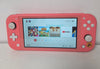 Nintendo Switch Lite Coral with unboxed Mario 8 Game