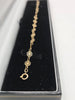 9K HALLMARKED (375) GOLD flower bracelet , 2.2grams