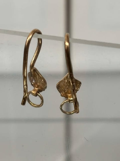 14K gold earrings hallmarked 1.55G **preowned **