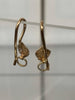 14K gold earrings hallmarked 1.55G **preowned **