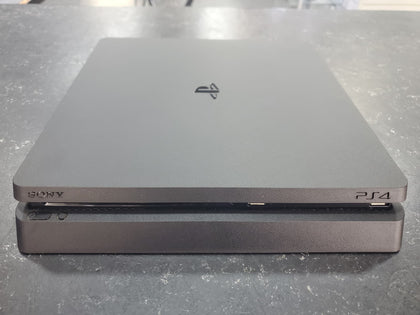PLAYSTATION 4 500GB W/ RESIDENT EVIL 7