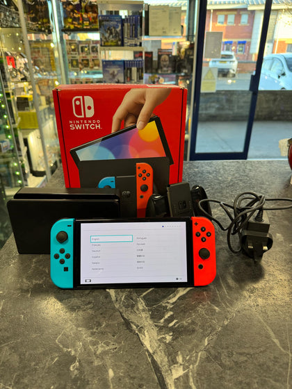 Nintendo Switch OLED Model w/Neon Red & Neon Blue Joy-Con