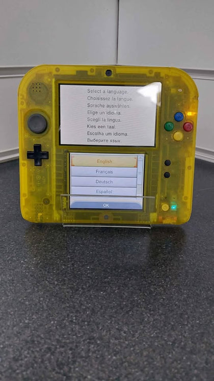 Nintendo 2DS pokemon edition transparent yellow unboxed with power cable has scratch on screen