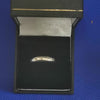 9 Karat 2.3 gram gold ring with Moissanite stones - size M box included