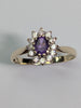 9ct gold ring with purple centre stone