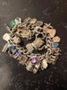 Silver vintage charm bracelet 117g with 30 plus charms