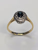 18ct gold diamond & black stone ring