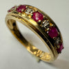 9ct gold ring with red and clear stones size O