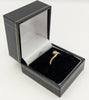 375 9CT HALLMARKED, YELLOW GOLD, TWISTING BAND WITH SINGLE STONE, SIZE:M, 2G, BOXED