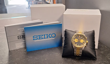 Seiko Men's Black Dial Two-Tone Stainless Steel Band Chronograph GMT.