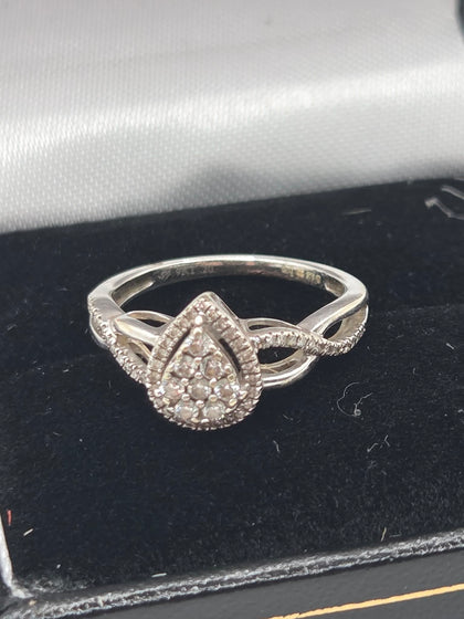 9CT gold hallmarked teardrop shaped diamond ring . 2.0 grams size i