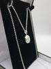 925 silver hallmarked 24" round lokcet with chain. 9.3 grams comes with box