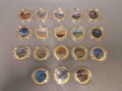 18x Age of the Dinosaurs coins. 24 carat gold plated copper, certificates of authenticity and protective sleeves included