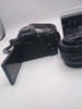 Canon EOS Rebel SL3 DSLR Camera with 18-55mm Lens Black & a 50mm lens