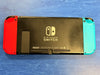 nintendo switch console red and blue joycons