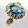 9ct yellow gold oval blue topaz & diamond cluster cocktail ring size L