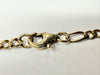 9ct gold figaro chain 21.5"