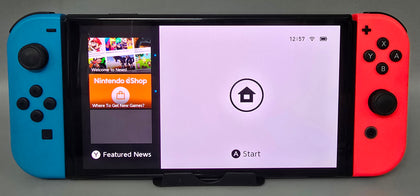 Switch Console, 64GB OLED + Neon Red/Blue Joy-Con, Boxed