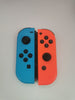 Missing grips/ Dents on Joycon Nintendo Switch Console, 32GB, HAC-001-01, Red/Blue Joycons,  with dock & charger