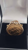 22ct Full Sovereign (7.9g) in 9ct mount/ chain (1.5g) holder. Year 1899