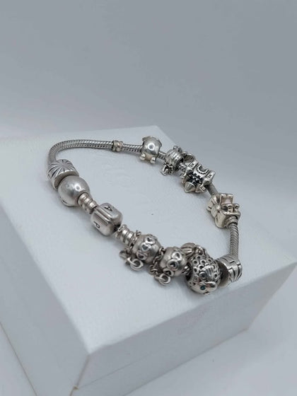 Pandora hallmarked bracelete with 9 charms( 4 charms not hallmarked )